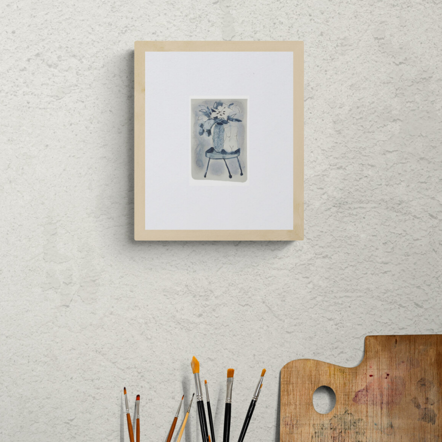 Framed drawing on a wall.